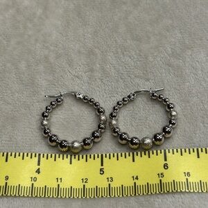 Rod Houma played Hoop Earrings